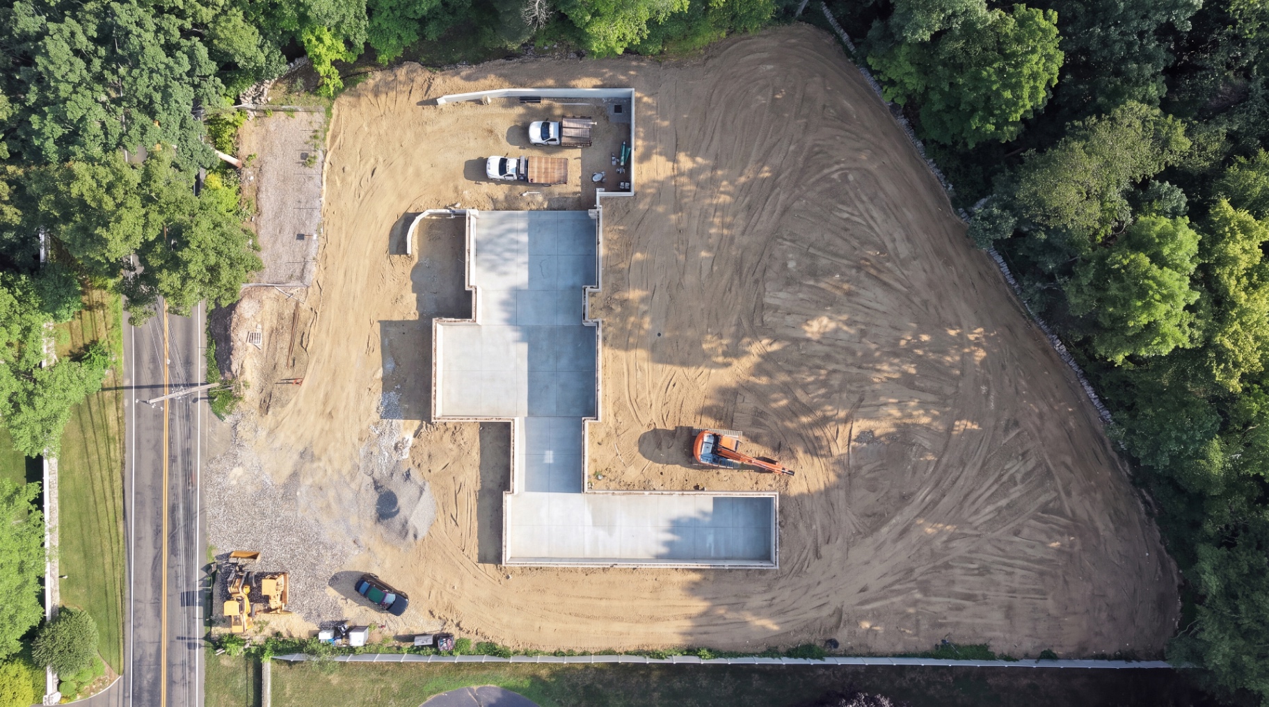 Aerial view of completed foundation walls with the first-floor deck poured.